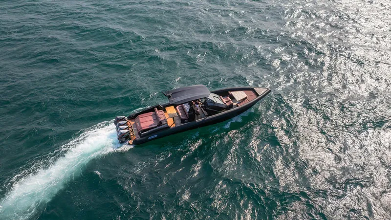 Slide: The Image of Aerial view of 2023 Skipper-BSK 42 boat cruising on open water. - 40