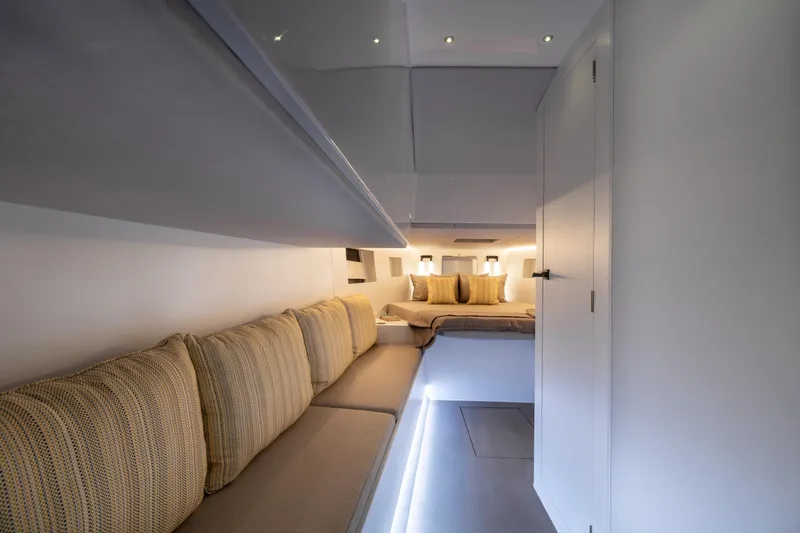 Slide: The Image of Luxurious interior of Introductory ZYARA 44 yacht, 2025 model, featuring modern seating and ambient lighting. - 11