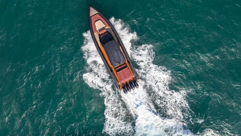 Slide: The Image of Aerial view of 2023 Skipper-BSK 42 boat cruising on open water. - 20