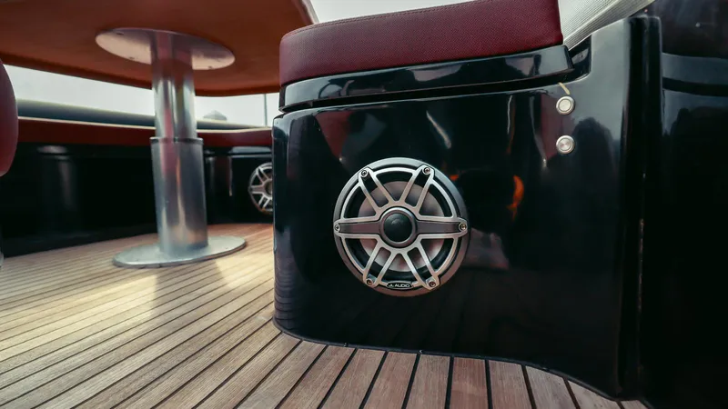 Slide: The Image of Luxury Skipper-BSK 42 yacht interior with sleek speaker and wooden flooring, 2023 model. - 23