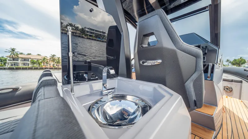 Slide: The Image of Luxury interior of 2025 Skipper 38 boat with sleek sink and modern seating. - 29