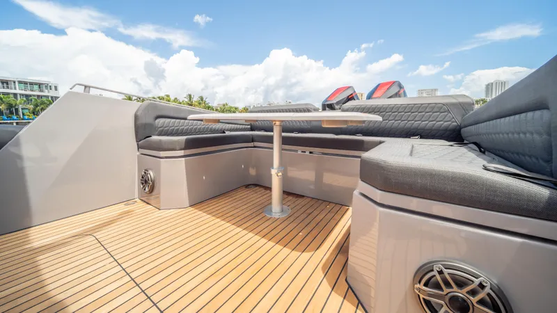 Slide: The Image of Luxury seating area on 2025 Skipper 38 yacht with sleek design and wooden deck. - 31