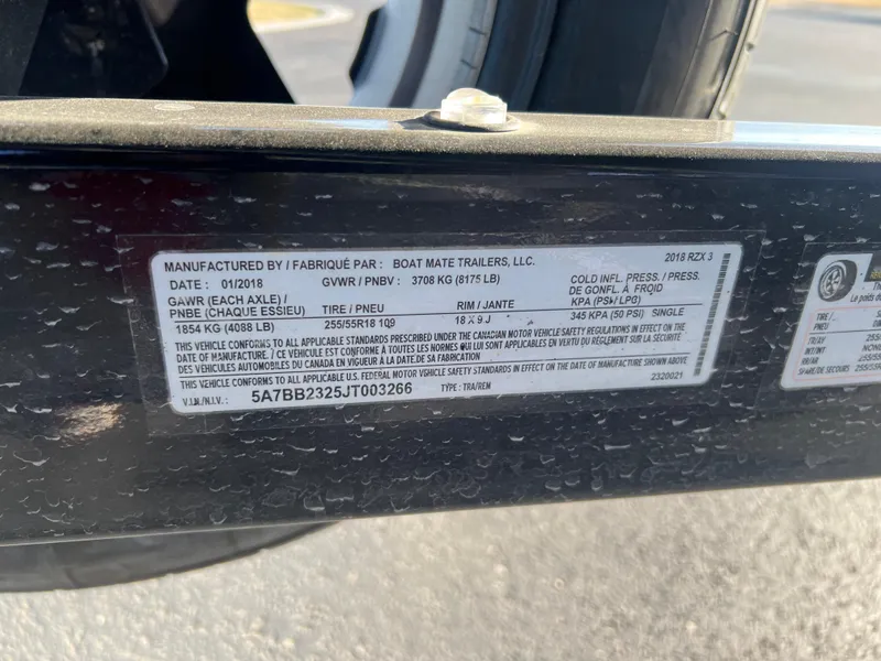 Slide: The Image of Label on 2018 Tigé RZX3 trailer showing specifications and compliance details. - 27