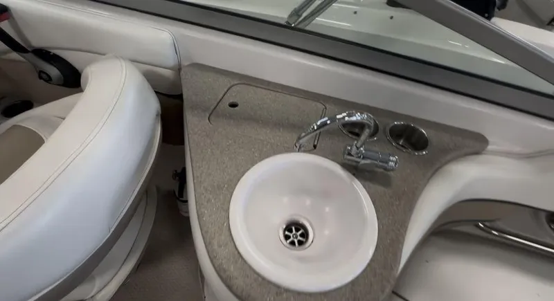 Slide: The Image of 2006 Four Winns 260 Horizon boat interior with sink and faucet. - 6