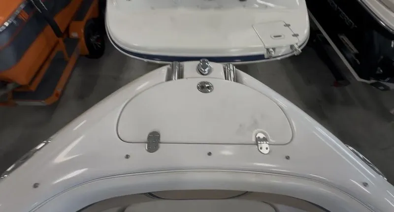Slide: The Image of 2006 Four Winns 260 Horizon boat bow with storage compartment and anchor locker. - 8