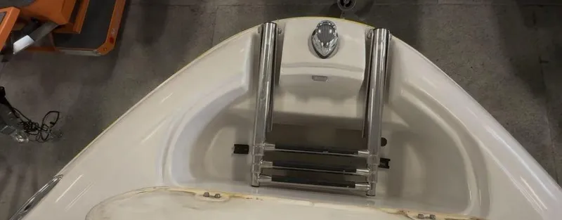 Slide: The Image of Bow of 2006 Four Winns 260 Horizon boat with stainless steel ladder. - 9