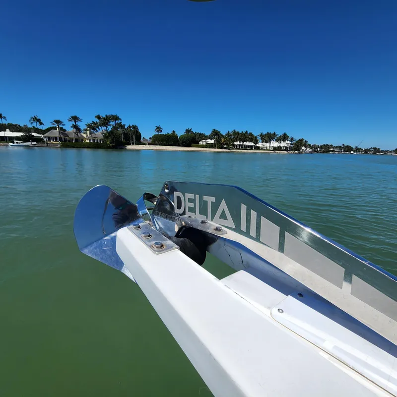 Slide: The Image of 2009 Sabre 34 Express boat with Delta II anchor on calm water. - 11