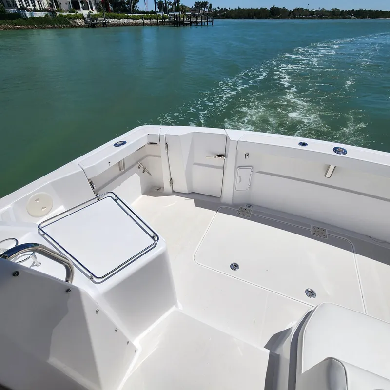 Slide: The Image of 2009 Sabre 34 Express boat deck with scenic water view. - 15