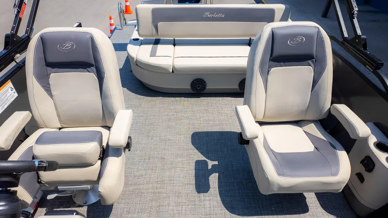 Slide: The Image of 2024 Barletta ARIA 22UC boat interior with plush seating and modern design. - 13