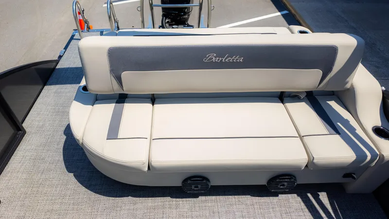 Slide: The Image of 2024 Barletta ARIA 22UC boat seating with elegant upholstery and cup holders. - 14