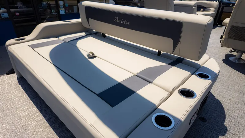 Slide: The Image of 2024 Barletta ARIA 22UC boat seating with cup holders and stylish upholstery. - 15