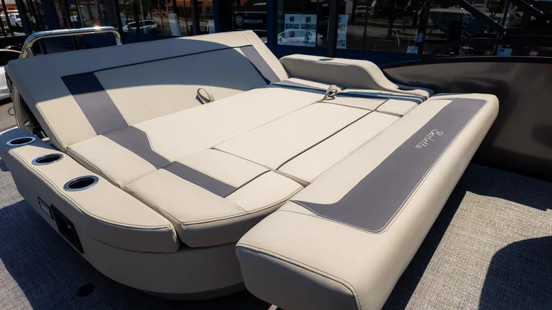Slide: The Image of 2024 Barletta ARIA 22UC boat interior with luxurious seating and cup holders. - 16