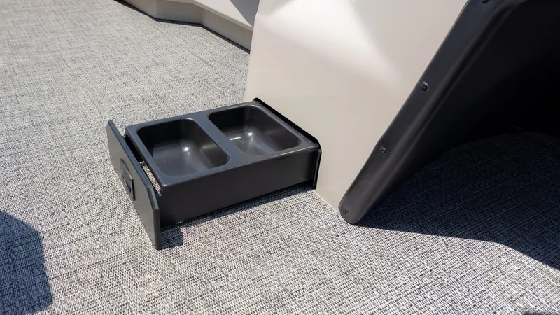 Slide: The Image of 2024 Barletta ARIA 22UC boat with built-in dual cup holder on deck. - 25