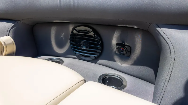 Slide: The Image of 2024 Barletta ARIA 22UC interior with speaker and cup holders. - 27