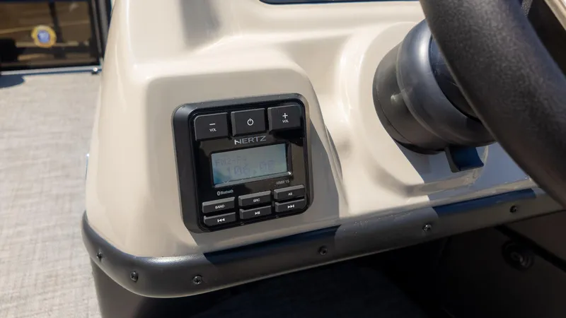 Slide: The Image of 2024 Barletta ARIA 22UC dashboard with Hertz audio system and steering wheel. - 29