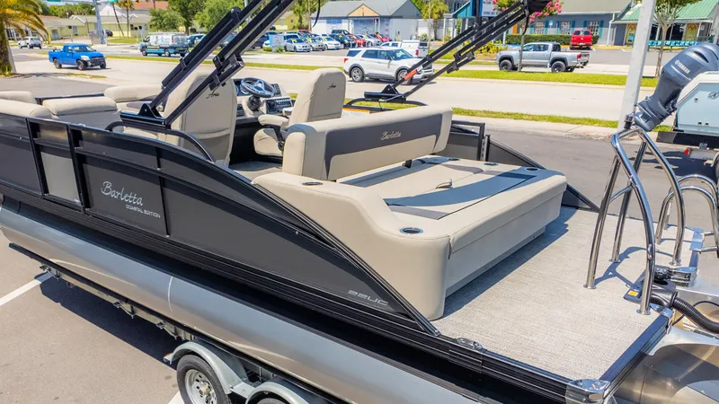 Slide: The Image of 2024 Barletta ARIA 22UC pontoon boat with luxurious seating and modern design. - 6