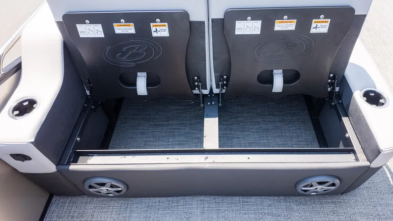 Slide: The Image of 2025 Barletta Cabrio 24UE boat seating with storage and cup holders. - 14