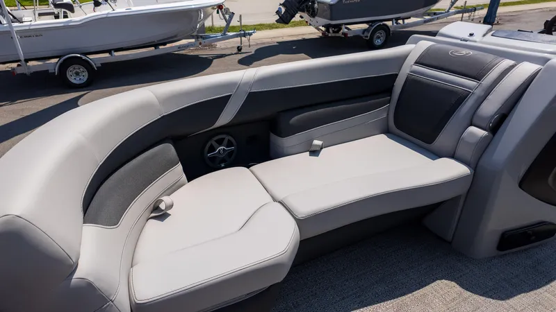 Slide: The Image of 2025 Barletta Cabrio 24UE boat interior with luxurious seating and modern design. - 20