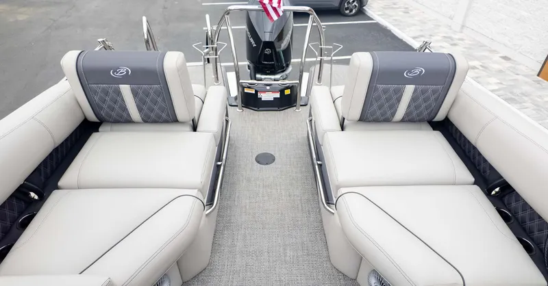 Slide: The Image of 2025 Barletta Lusso 23M pontoon boat interior with luxurious seating and modern design. - 12