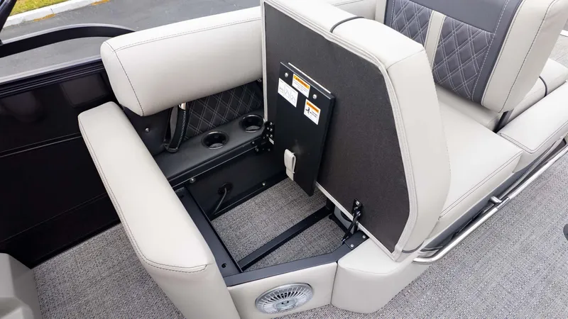 Slide: The Image of 2025 Barletta Lusso 23M boat interior with foldable seat and storage compartment. - 13