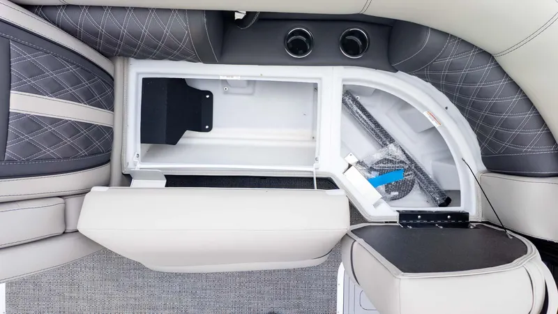 Slide: The Image of 2025 Barletta Lusso 23M interior storage compartment with elegant seating and quilted design. - 20