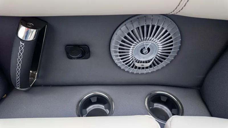 Slide: The Image of Interior of 2025 Barletta Lusso 23M with speaker, cup holders, and handle. - 21