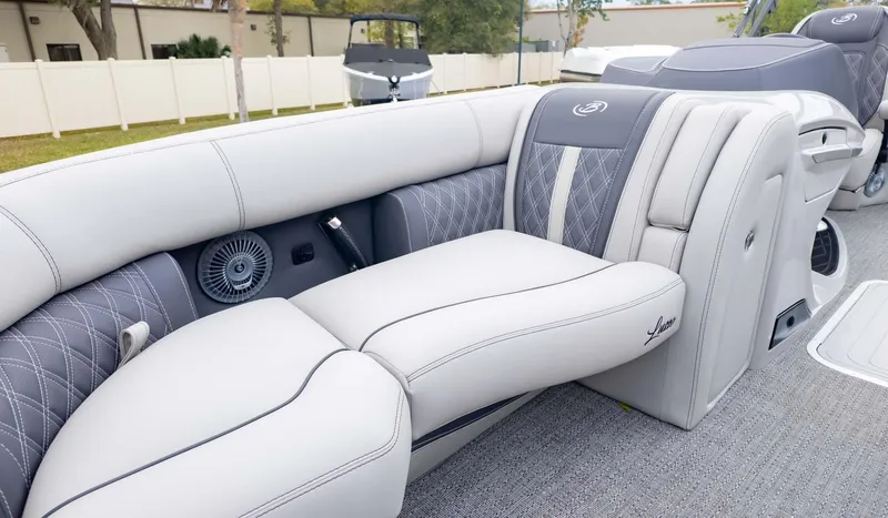 Slide: The Image of Luxurious seating on 2025 Barletta Lusso 23M pontoon boat, featuring elegant design and comfort. - 23