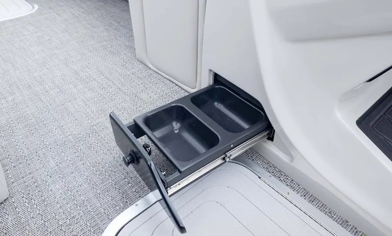 Slide: The Image of Pull-out storage compartment in 2025 Barletta Lusso 23M boat interior. - 25