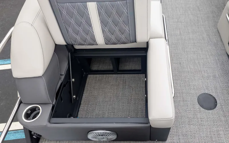 Slide: The Image of 2025 Barletta Lusso 23M boat seat with storage compartment, cup holder, and speaker. - 9
