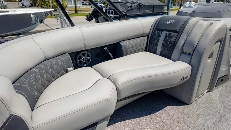 Slide: The Image of Luxurious seating on 2025 Barletta Lusso 25UE pontoon boat, featuring elegant design and comfort. - 21