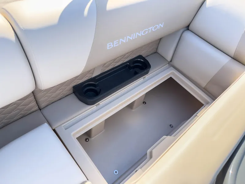 Slide: The Image of 2024 Bennington 188 SL boat seat with storage compartment and cup holders. - 14