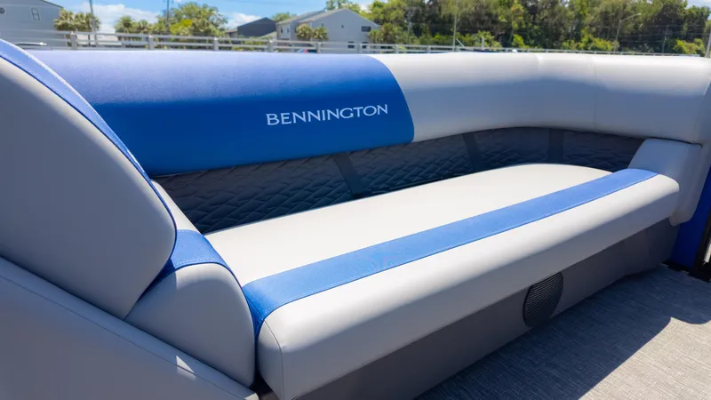 Slide: The Image of 2024 Bennington 20 SSR boat seating with blue and gray upholstery. - 19