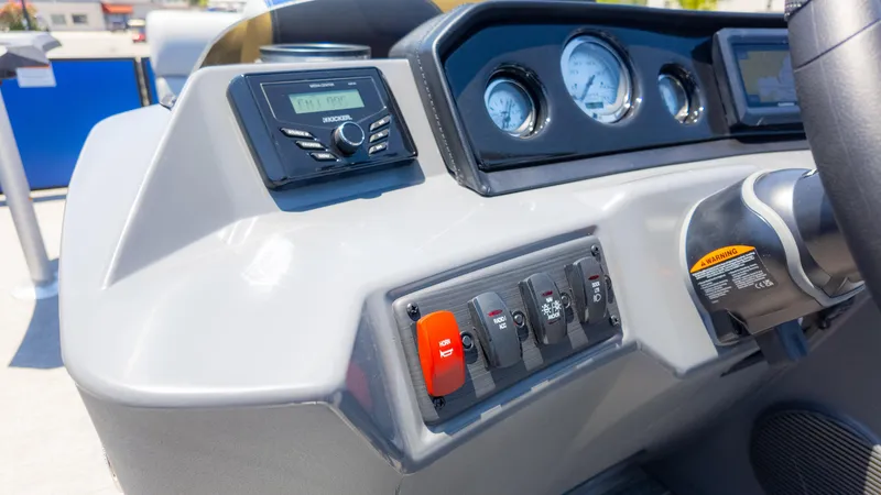 Slide: The Image of Dashboard of a 2024 Bennington 20 SSR boat with controls and gauges. - 29