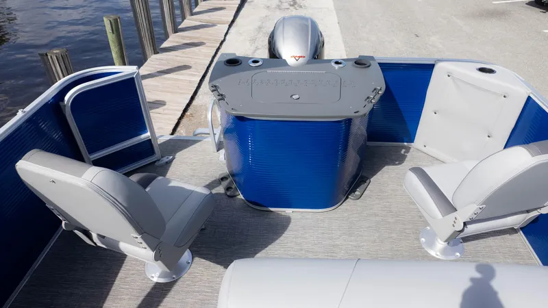 Slide: The Image of 2025 Bennington 20 SVS Stern Fish boat interior with seating and control panel. - 12