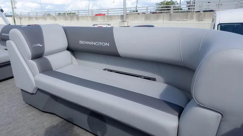 Slide: The Image of 2025 Bennington 20 SVS Stern Fish boat seating, featuring gray upholstery and sleek design. - 17