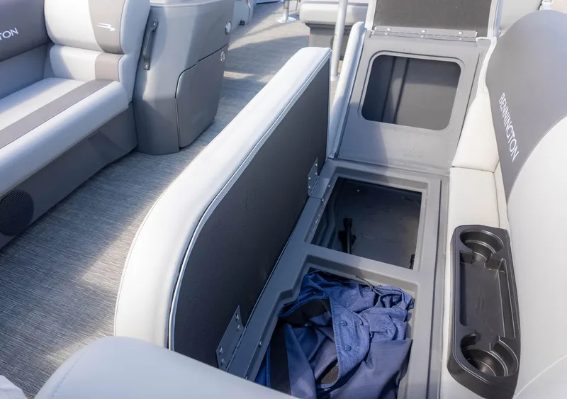 Slide: The Image of 2025 Bennington 20 SVS Stern Fish boat interior with storage compartment open. - 18