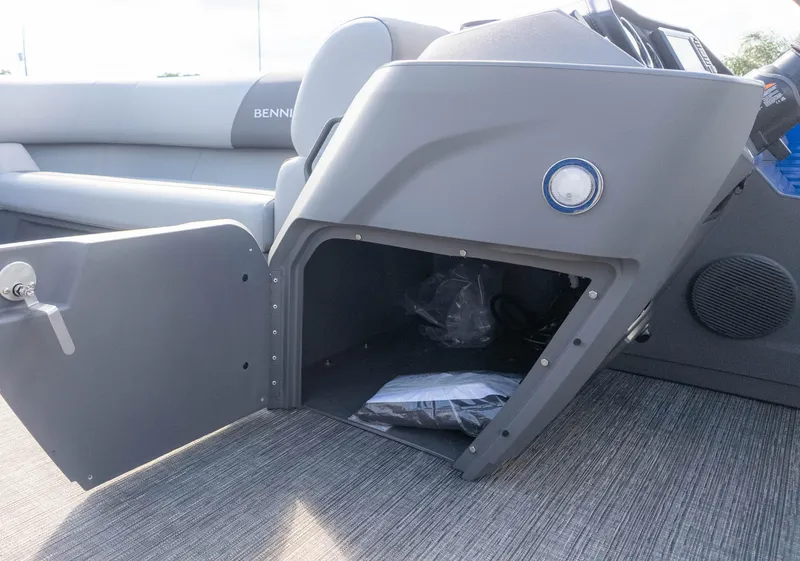 Slide: The Image of Open storage compartment in 2025 Bennington 20 SVS Stern Fish boat interior. - 20
