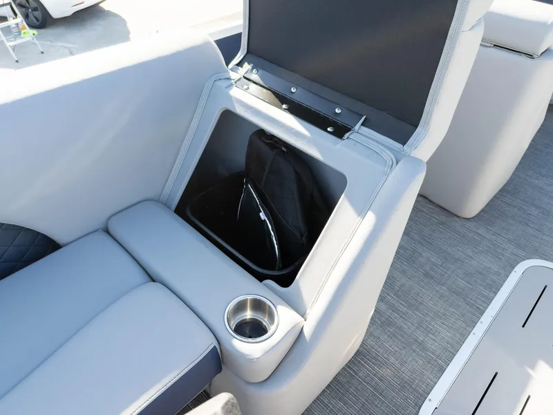 Slide: The Image of 2024 Bennington 22 LSB boat seat with storage compartment and cup holder. - 23
