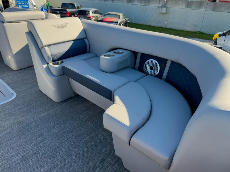 Slide: The Image of 2024 Bennington 22 LSB boat interior with luxurious seating and cup holders. - 25