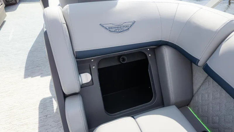 Slide: The Image of 2025 Bennington 22 MFB boat seat with storage compartment, featuring sleek design and logo. - 10