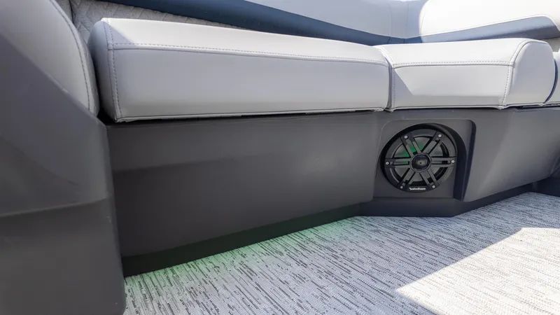 Slide: The Image of Interior of 2025 Bennington 22 MFB boat with cushioned seating and built-in speaker. - 11