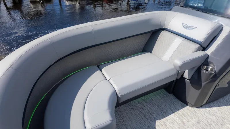 Slide: The Image of Luxurious seating on the 2025 Bennington 22 MFB boat, featuring elegant gray upholstery. - 17