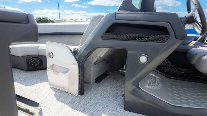 Slide: The Image of Interior of 2025 Bennington 22 MFB boat, featuring seating and storage compartments. - 20