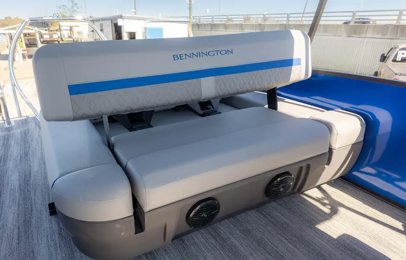 Slide: The Image of 2025 Bennington 22 MSB boat seat with blue accents and integrated speakers. - 10