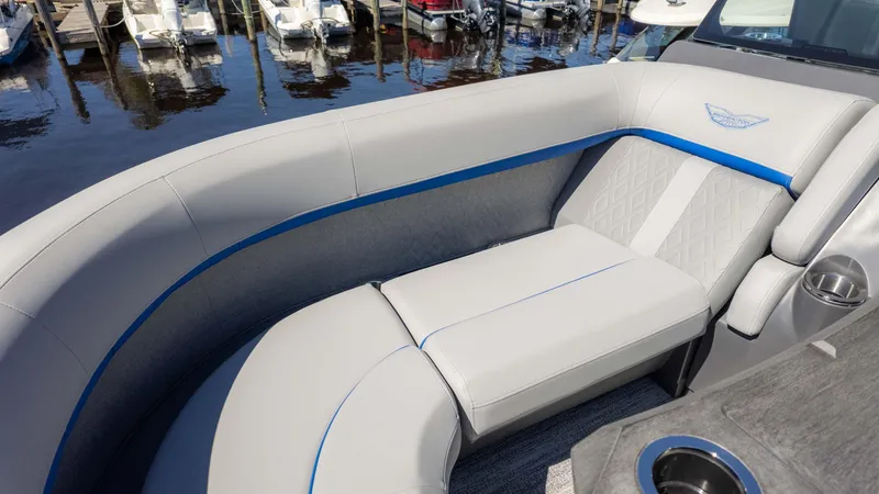 Slide: The Image of Luxurious seating on 2025 Bennington 22 MSB boat, featuring elegant design and waterfront view. - 16