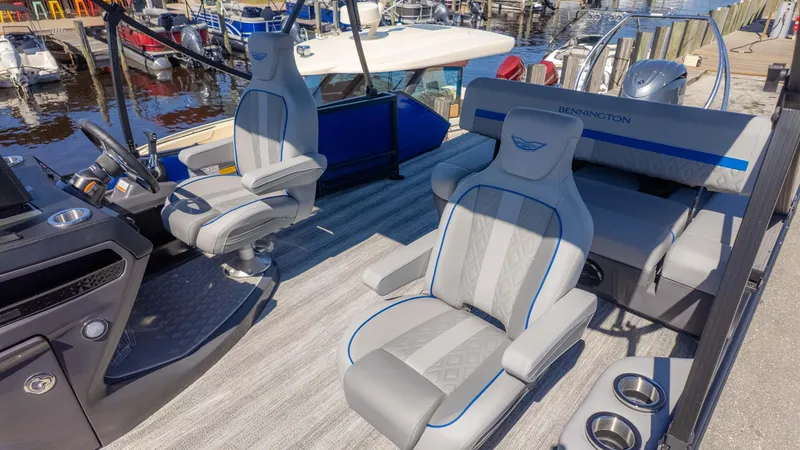 Slide: The Image of Luxurious interior of 2025 Bennington 22 MSB boat with plush seating and modern design. - 6