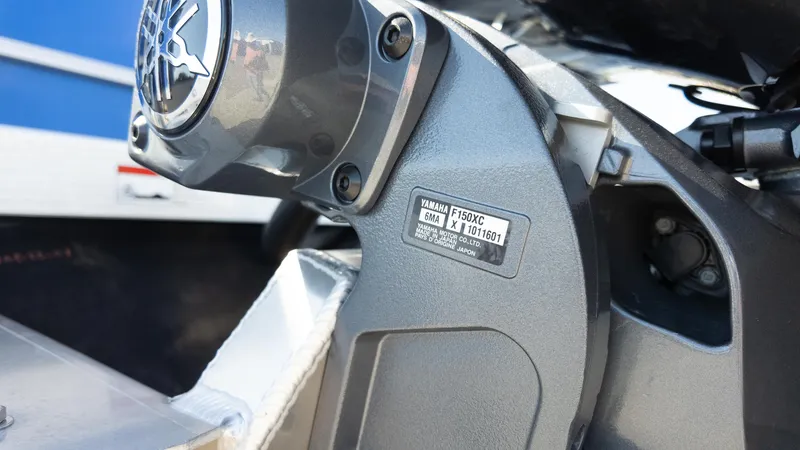 Slide: The Image of Close-up of Yamaha F150XC engine on 2025 Bennington 22 SSR boat. - 8