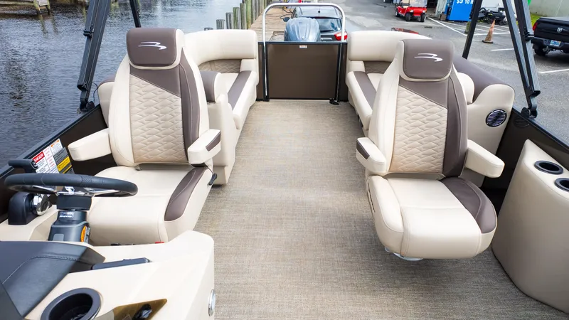 Slide: The Image of 2025 Bennington 22 SSR pontoon boat interior with luxurious seating and modern design. - 10