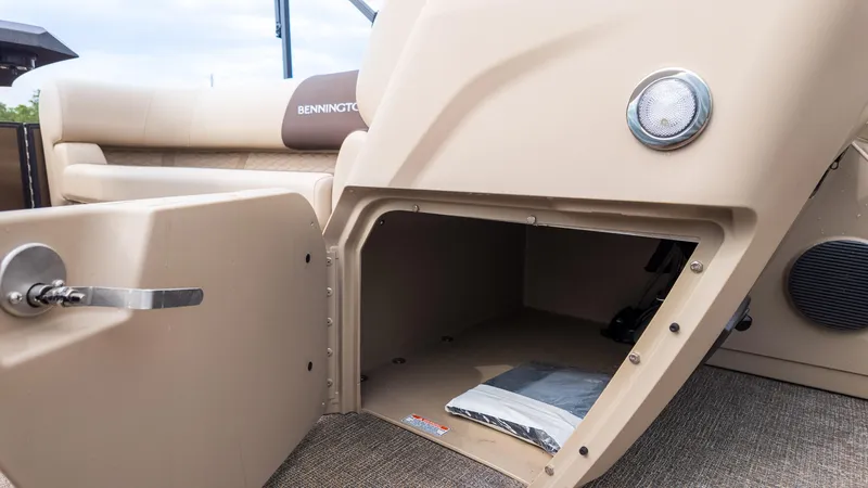 Slide: The Image of Open storage compartment on 2025 Bennington 22 SSR boat, showcasing interior space and design. - 22