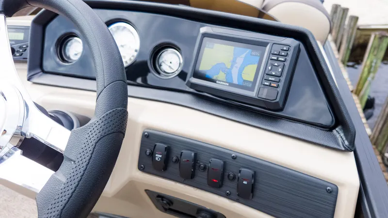 Slide: The Image of 2025 Bennington 22 SSR dashboard with GPS and control panel. - 26